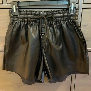 Black leather shorts